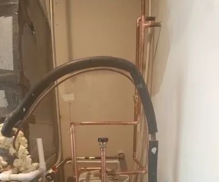 Jack L Woods Plumbing Co Inc