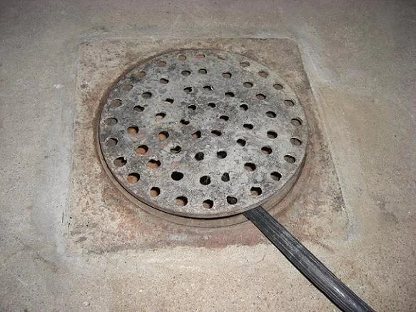 How to Replace a Floor Drain Cover That Is Damaged