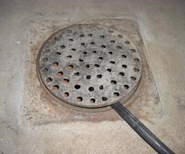 How to Replace a Floor Drain Cover That Is Damaged