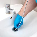 How to Clear Stubborn Hair Clogs from Bathroom Drains – Effective Solutions