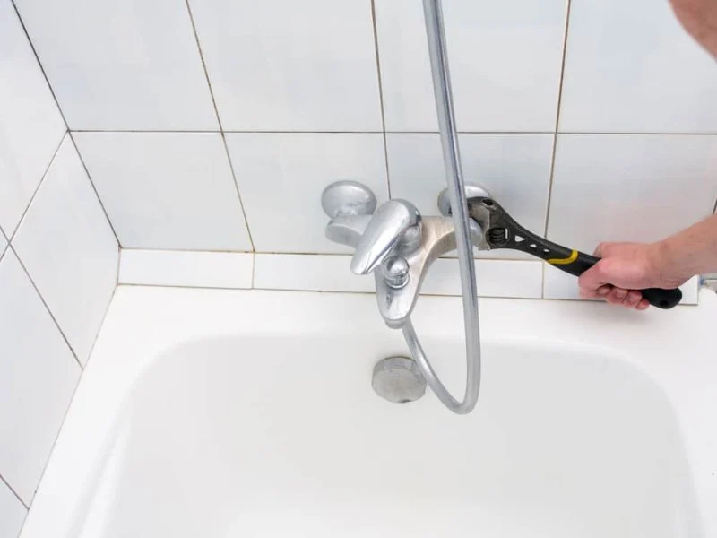 How to Fix Water Leaks Around a Bathtub Enclosure