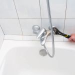 How to Fix Water Leaks Around a Bathtub Enclosure