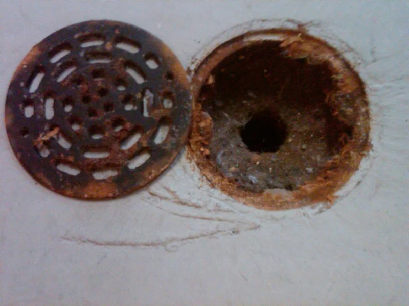 How to Replace a Floor Drain Cover That Is Damaged