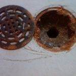 How to Replace a Floor Drain Cover That Is Damaged