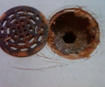 How to Replace a Floor Drain Cover That Is Damaged