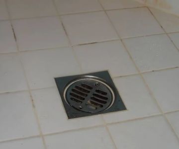 Why Water Bubbles Up Through the Floor Drain: Causes and Solutions